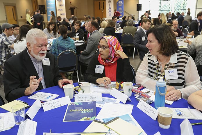 (L-r) Msgr. Henry Gracz, pastor of Shrine of the Immaculate Conception, Atlanta, Soumaya Khalifa of the Islamic Speakers Bureau of Atlanta, and Judy Marx, executive director of the Interfaith Community Initiatives, Atlanta, participate with others in the second of two table discussions, which took place at the Atlanta Initiative Against Anti-Semitism’s March 30 leadership forum on anti-Semitism. Photo By Michael Alexander