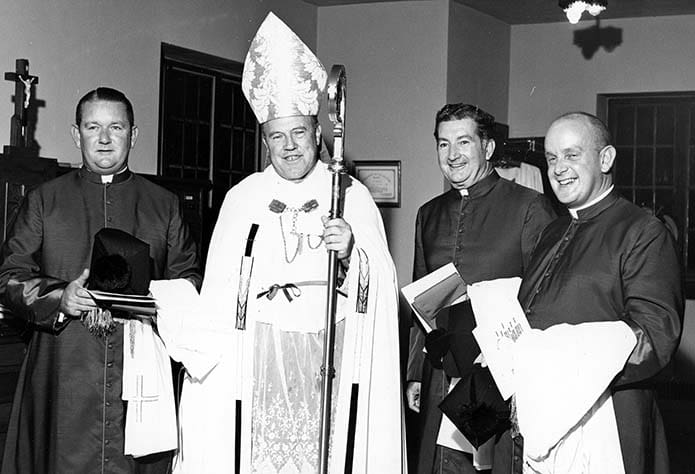 The investiture of Father R. Donald Kiernan, far right, to the title of monsignor by Archbishop Thomas A. Donnellan, second from left, took place on Oct. 10, 1969 at the Cathedral of Christ the King, Atlanta.