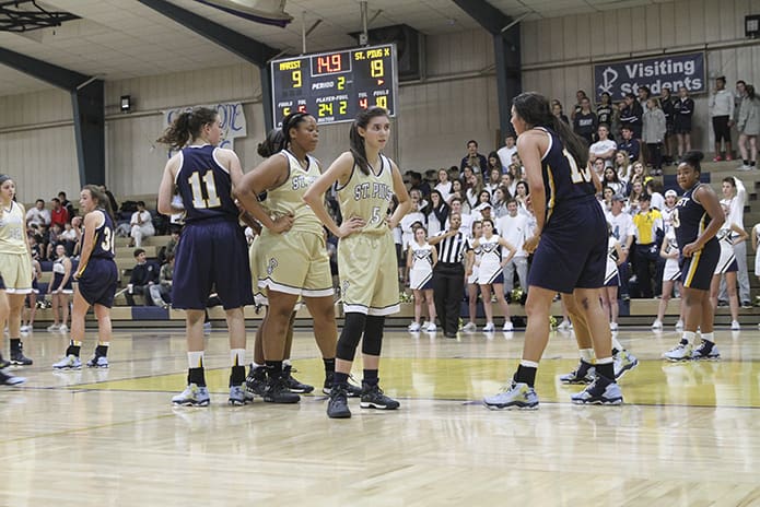 St. Pius X sophomore guard Emma Drash (#5) and her teammates line up for an inbounds play under their basket during the second period of the game. Drash led her team in scoring with 13 points, including four three-pointers. Photo By Michael Alexander