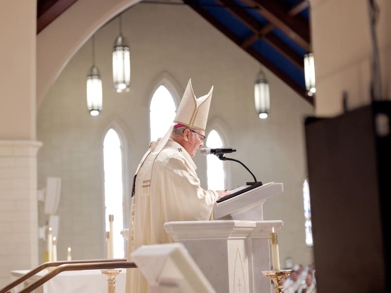 Archbishop Gregory J. Hartmayer, OFM Conv., delivers the homily during the ordination of Bishop John Nhan Tran at St. Peter Chanel Church. Photo by Johnathon Kelso