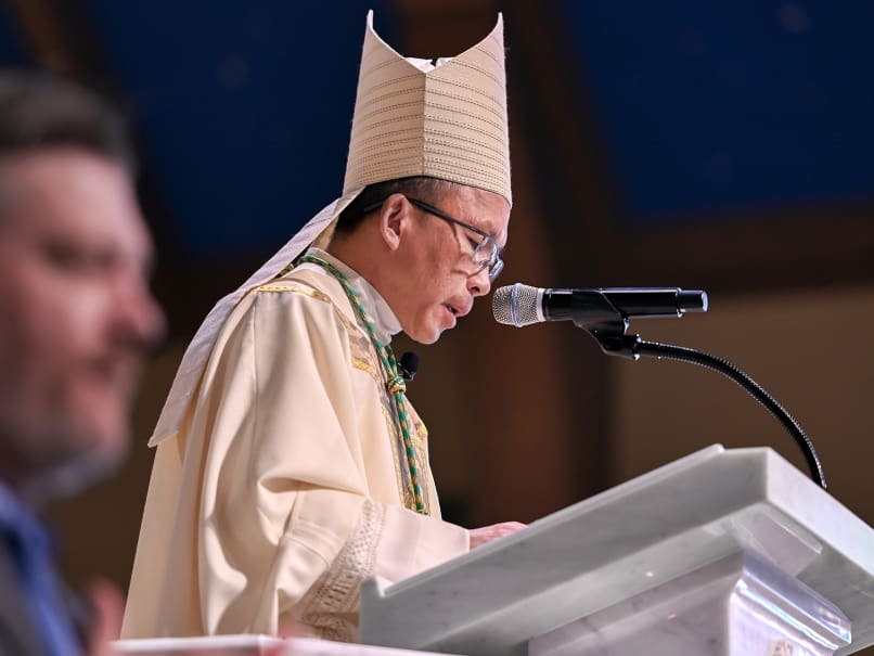 Bishop John Nhan Tran expresses thanks during the close of the Mass at St. Peter Chanel Church. Photo by Johnathon Kelso