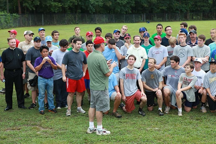 Bishop Bernard E. (Ned) Shlesinger III, who at the time was Father Shlesinger, director of vocations and seminarian formation for the Diocese of Raleigh, addresses a group that partook in the first Seminarians’ Summer Vocation Invitational, July 12, 2012, at the Father Thomas Price Knights of Columbus Council 2546 facility in Raleigh. The invitational, which included kickball, involved athletic events pitting the diocesan seminarians against teams made up of high school and college-age men. Photo Courtesy of the Diocese of Raleigh