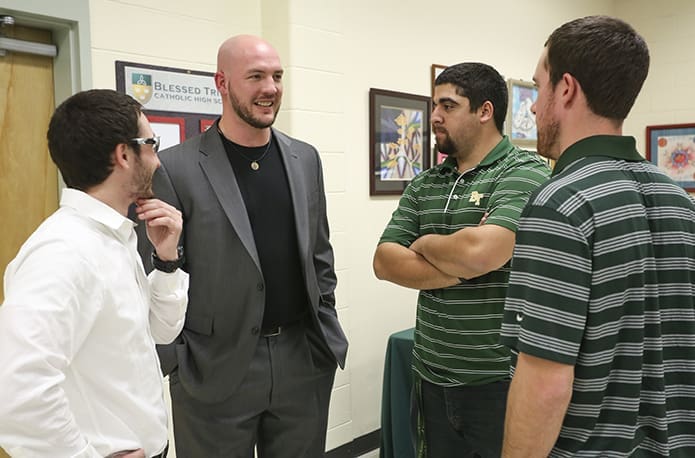 Tyler Flowers, second from left, Chicago White Sox starting catcher, chats with some of his former baseball and football teammates, including (l-r) Jameson Contratto, Evan Tieles and Shane Doyle. Photo By Michael Alexander