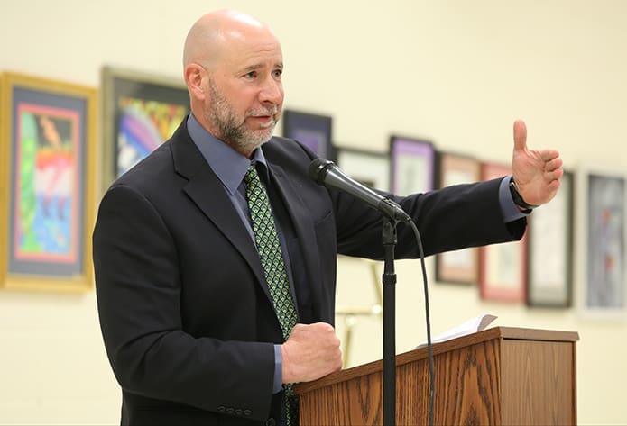 Varsity baseball coach Andy Harlin shares some stories about Athletic Hall of Fame inductee Tyler Flowers during the induction ceremony that drew nearly 150 people. Photo By Michael Alexander