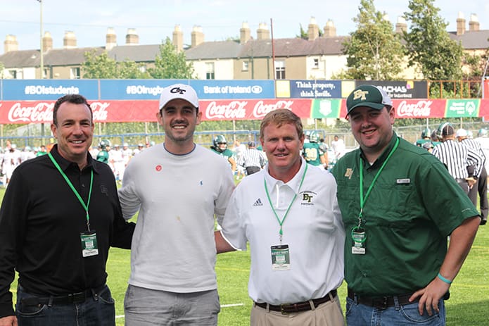 (L-r) Blessed Trinity High School principal Brian Marks, 2005 BT graduate Kevin Crosby, Blessed Trinity athletic director Ricky Turner and school communications coordinator and 2007 BT graduate Patrick Dever pose for a photograph the day of the American Football Showcase at Donnybrook Stadium in Dublin, Ireland. Crosby was a punter for Blessed Trinity and Georgia Tech during his high school and collegiate football years.