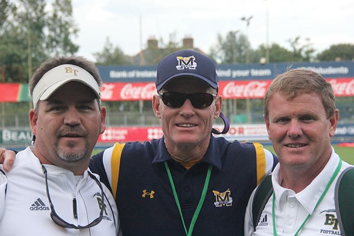 (L-r) Blessed Trinity High School defensive coordinator Tim Ewing, Tommy Marshall, Marist School athletic director, and Ricky Turner, Blessed Trinity athletic director, pose for a photograph on the day of 2016 American Football Showcase in Dublin, Ireland. Photo By Patrick Dever