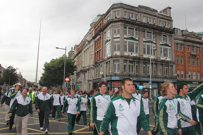 Blessed Trinity High School football coaches, players and trainers walk in the Sept. 1 parade through downtown Dublin, Ireland. Photo By Patrick Dever