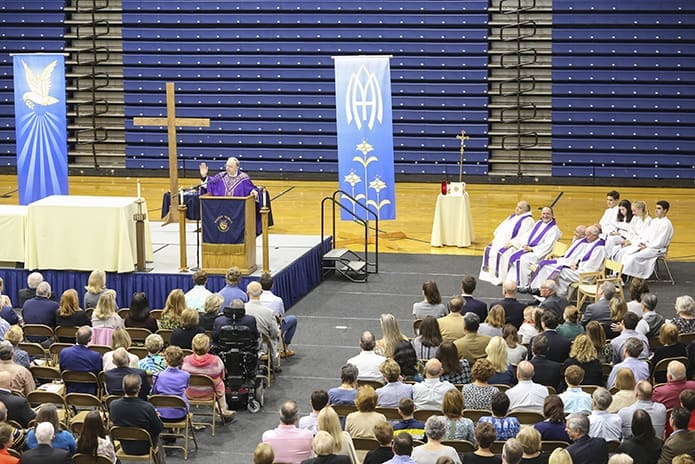 Bishop-designate Joel M. Konzen, SM, gives some closing remarks during the Family Mass in his honor at Marist School’s Centennial Center. As he assumes a new role, he said a heartfelt goodbye to the school community. He noted, however, that he plans to return to Marist in May for the school’s baccalaureate and graduation. Photo By Michael Alexander