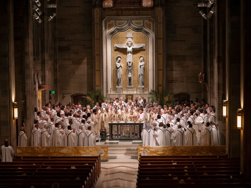 Archbishop Gregory J. Hartmayer, OFM Conv., the auxiliary bishops and clergy surround the altar during the Chrism Mass held at Cathedral of Christ the King. Photo by Johnathon Kelso