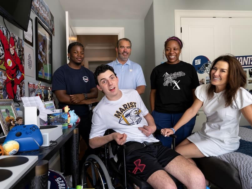 The Corbett Family photographed at their home with Devon's caretakers Edwin Lamarre and Shay Jinks. Photo by Johnathon Kelso