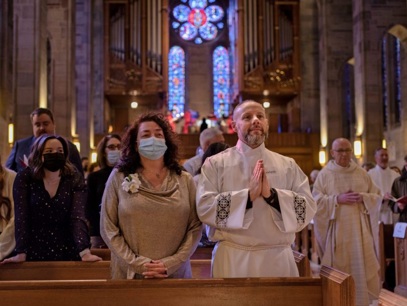 Deacon Kenneth Dawson Jr., stands with his wife, Christine, during the Mass of Ordination to the Permanent Diaconate at the Cathedral of Christ the King. Photo by Johnathon Kelso