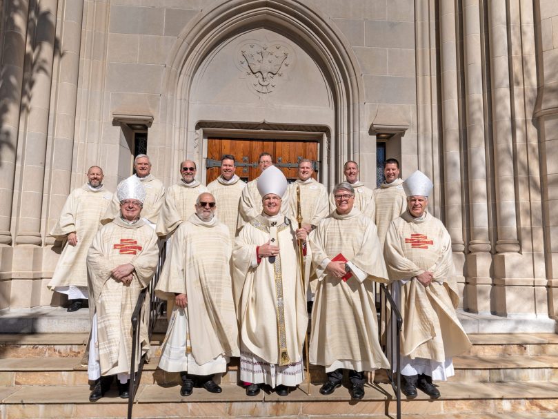 The new permanent deacons gather with Archbishop Gregory J. Hartmayer, OFM Conv., following the Mass of Ordination to the Permanent Diaconate at the Cathedral of Christ the King. From left to right back row: Deacon Kenneth Dawson Jr., Deacon Joseph Hrovat, Deacon Geza Gereben, Deacon Rodney Arion, Deacon David Patterson, Deacon Stan Stewart, Deacon James Martin and Deacon Kelly Stinson. From left to right front row: Bishop Joel M. Konzen, SM, Deacon Jose Espinosa, co-director of diaconate formation; with Archbishop Hartmayer, Deacon Dennis Dorner and Bishop Bernard E.  Shlesinger III. Photo by Johnathon Kelso