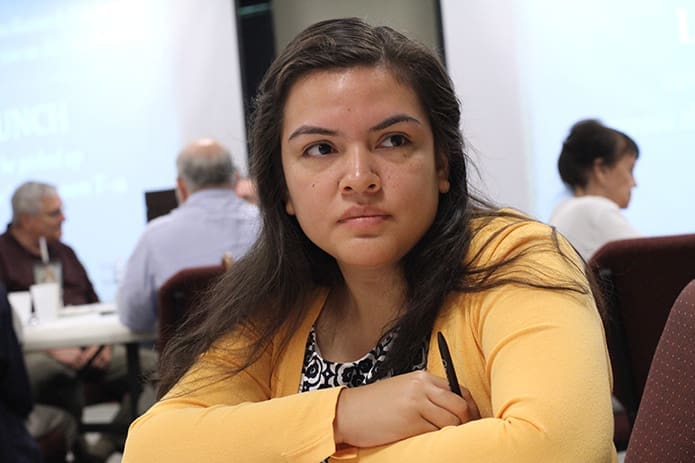 As a junior religious studies student at Georgia State University and a member of the Shrine of the Immaculate Conception parish, Irene Rivera, is on hand for the program that underscores the Catholic view on death penalty. Photo By Michael Alexander