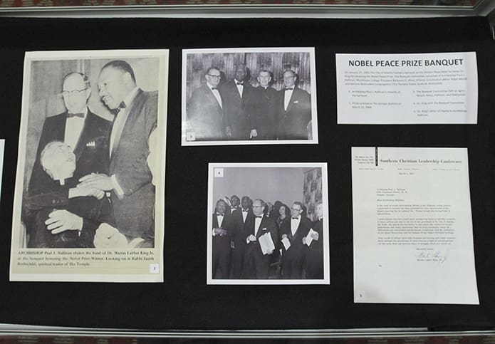 In the Cathedral of Christ the King’s Kenny Hall, the Office of Archives and Records featured five exhibit cases. This particular one highlighted the Nobel Peace Prize Banquet for Dr. Martin Luther King Jr. Archbishop Paul J. Hallinan, who appears in the exhibit, was a member of the banquet committee. The other exhibits included Dr. Martin Luther King Jr. celebrations, Integration at the Archdiocese of Atlanta, King’s Assassination and Marches & Protest. Photo By Michael Alexander