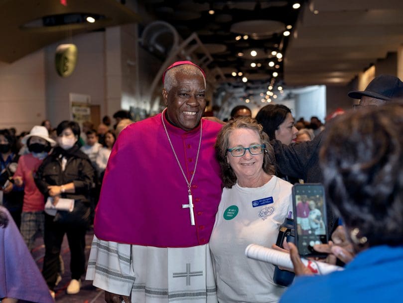 Bishop Jacques Fabre-Jeune, CS, of the Diocese of Charleston visits with Director of Religious Formation Mary Ellen Jackson of St. Mary Help of Christians Catholic Church in Aiken, South Carolina, during Atlanta's Eucharistic Congress. Photo by Johnathon Kelso