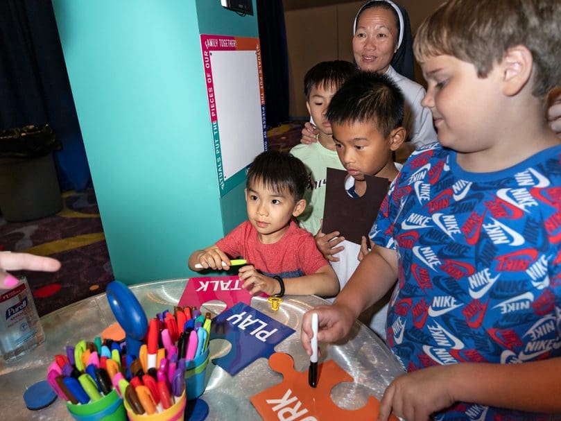Children and adults participate in the Family Track activities at the Eucharistic Congress. Photo by Johnathon Kelso