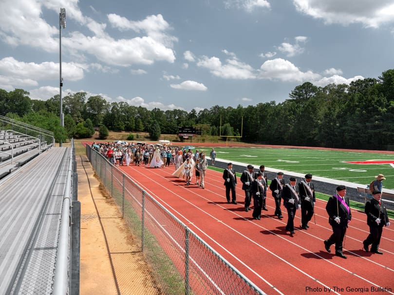 The faithful join a eucharistic procession at St. Mary's Academy in Fayetteville. The National Eucharistic Pilgrimage stopped at seven places in the Archdiocese of Atlanta. Photo by Johnathon Kelso
