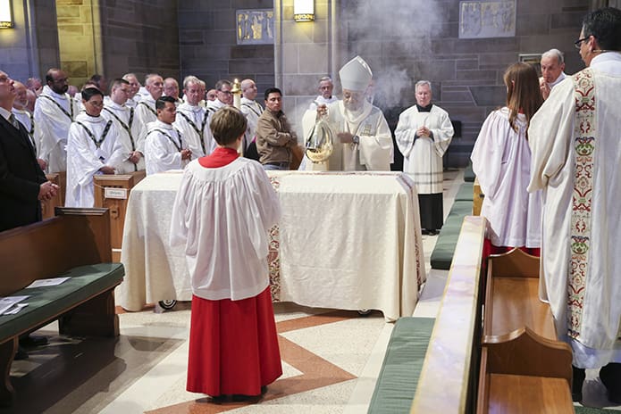 Archbishop Wilton D. Gregory censes the casket of Father Edward O’Connor during the final commendation of the Nov. 11 funeral Mass at the Cathedral of Christ the King, Atlanta. Photo By Michael Alexander