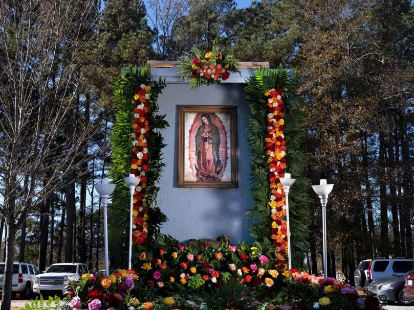 A float bearing the images of our Lady of Guadalupe sits outside the parish of San Felipe de Jesús Church in Forest Park. Photo by Johnathon Kelso
