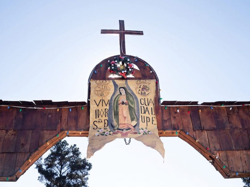 A hand-painted image of our Lady of Guadalupe adorns a canopy at San Felipe de Jesús Church. Photo by Johnathon Kelso