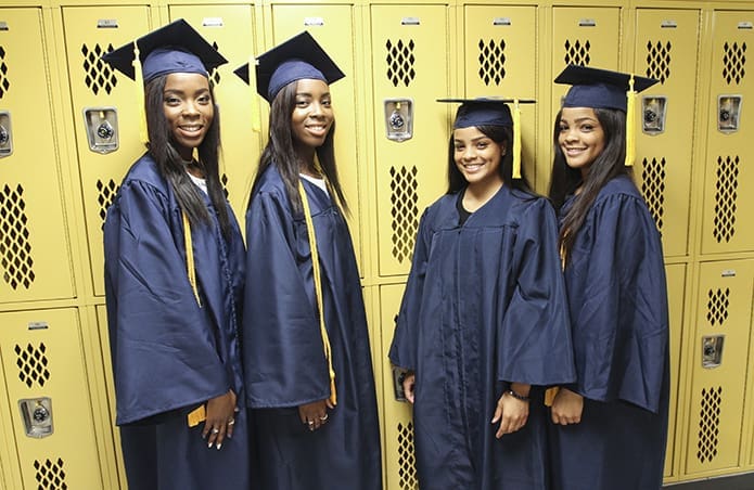 (L-r) Sandrine and Sandra Noumadji and Monica and Monique Epps are two of the three sets of twins in Cristo Rey Atlanta’s class of 2018. Sandrine, the oldest by seven minutes, is attending George Washington University, Washington, D.C., and Sandra is attending Wake Forest University, Winston-Salem, N.C. Monique, the oldest by two minutes, is attending Kennesaw State University, Kennesaw, and Monica is attending Georgia State University, Atlanta. Jaleel and Jamal Penton are the third set of twins. Photo By Michael Alexander
