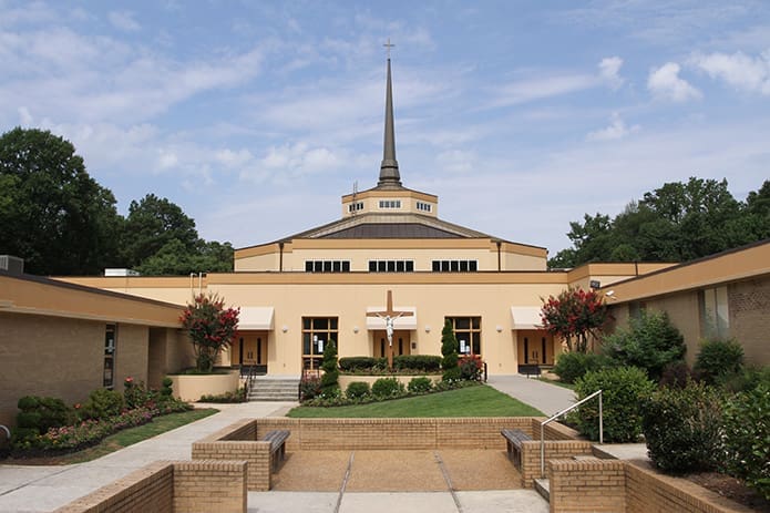Holy Cross Church started out as a mission of 200 families. In 1964 the Archdiocese of Atlanta elevated its status from a mission to a parish. The late Archbishop Eugene Marino dedicated the existing church in 1989. Photo By Michael Alexander