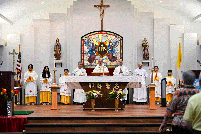 At the altar from left, Father Bill Hao, chaplain; Bishop Emeritus John Lee Juo-wang, and Father Francis Ching of the Companions of the Cross,  celebrate Mass for the Solemnity of Corpus Christi on June 22 at Holy Name of Jesus Mission  in Norcross. At right is Andrew Shen, a candidate in diaconate formation for Holy Name. Photo by Julianna Leopold