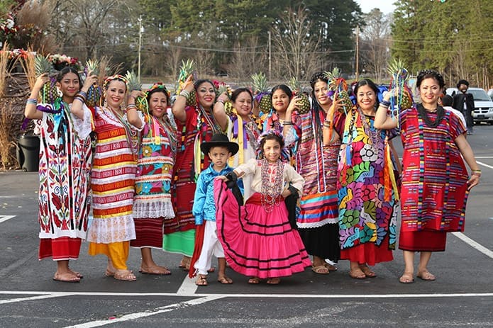 Members of the Donaji dance group pose after their performance of a traditional dance from Oaxaca in southern Mexico. Photo By Michael Alexander