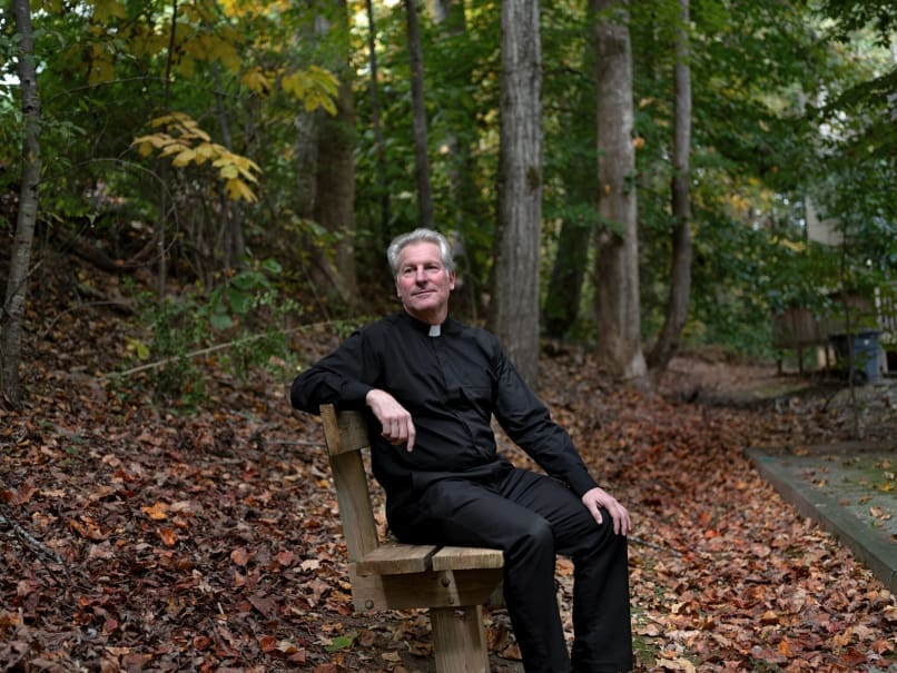 Father Bob Frederick, director of the KSU Catholic Center, says the center has a coffeehouse like atmosphere where students gather to catch up and spend time following daily Mass. The center just added a second Sunday Mass to its schedule. Photo by Johnathon Kelso