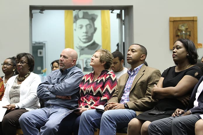 (Front row, l-r) Sylvia Battle, Lyke House advisory council member, Dave and Anna Schwarte, benefactors from Defiance, Iowa, Jarrett Datcher of Seattle, Wash., a former Lyke House member from Georgia Tech’s class of 2002, and Niki Sebastian, advisory council member, listen to the sounds of the Spelman College Glee Club during an anniversary weekend concert. Photo By Michael Alexander