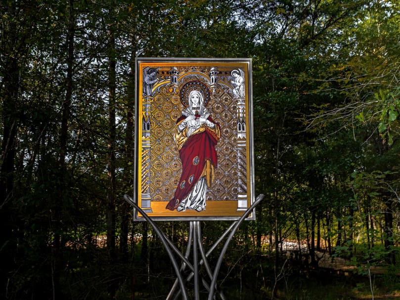 The Seven Sorrows Walk stations feature iron work by Mike Route and paintings of Mary’s sorrows by German artist Adele Helena Reut. Photo by Johnathon Kelso