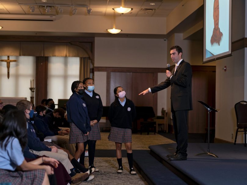 Director of Respect Life Ministry Joey Martineck speaks with students from St. John Neumann Regional School at the Jan. 21 Youth for Life Rally at Cathedral of Christ the King. Photo by Johnathon Kelso