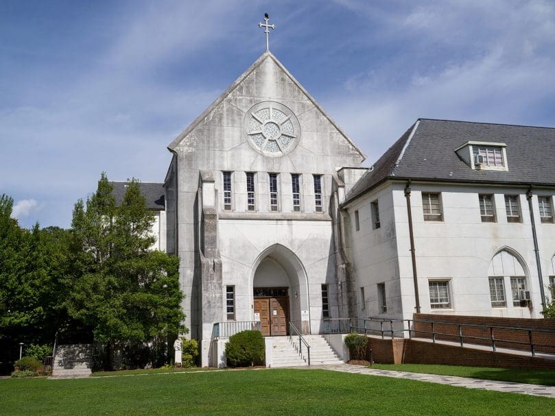 An exterior view of the sanctuary at the Monastery of the Holy Spirit in Conyers.  The community of Cistercian monks is reopening the church to the public for prayer and Mass after two years of closure. Photo by Johnathon Kelso