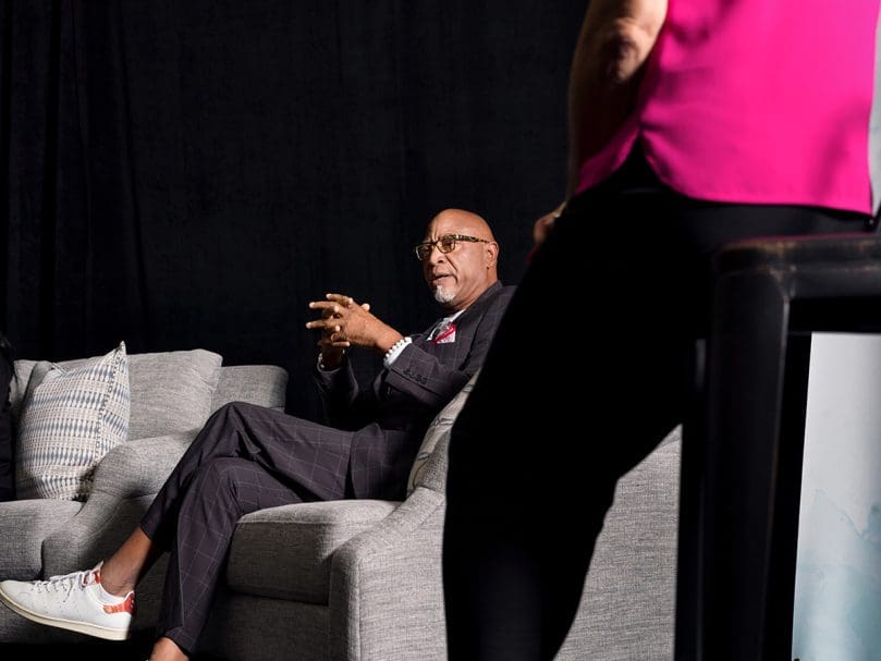 Derrick Crumpler, a St. Vincent de Paul Georgia community pharmacy patient, speaks during the "Voices of Hope" segment of the program presented during the Morning of Hope event. Photo by Johnathon Kelso