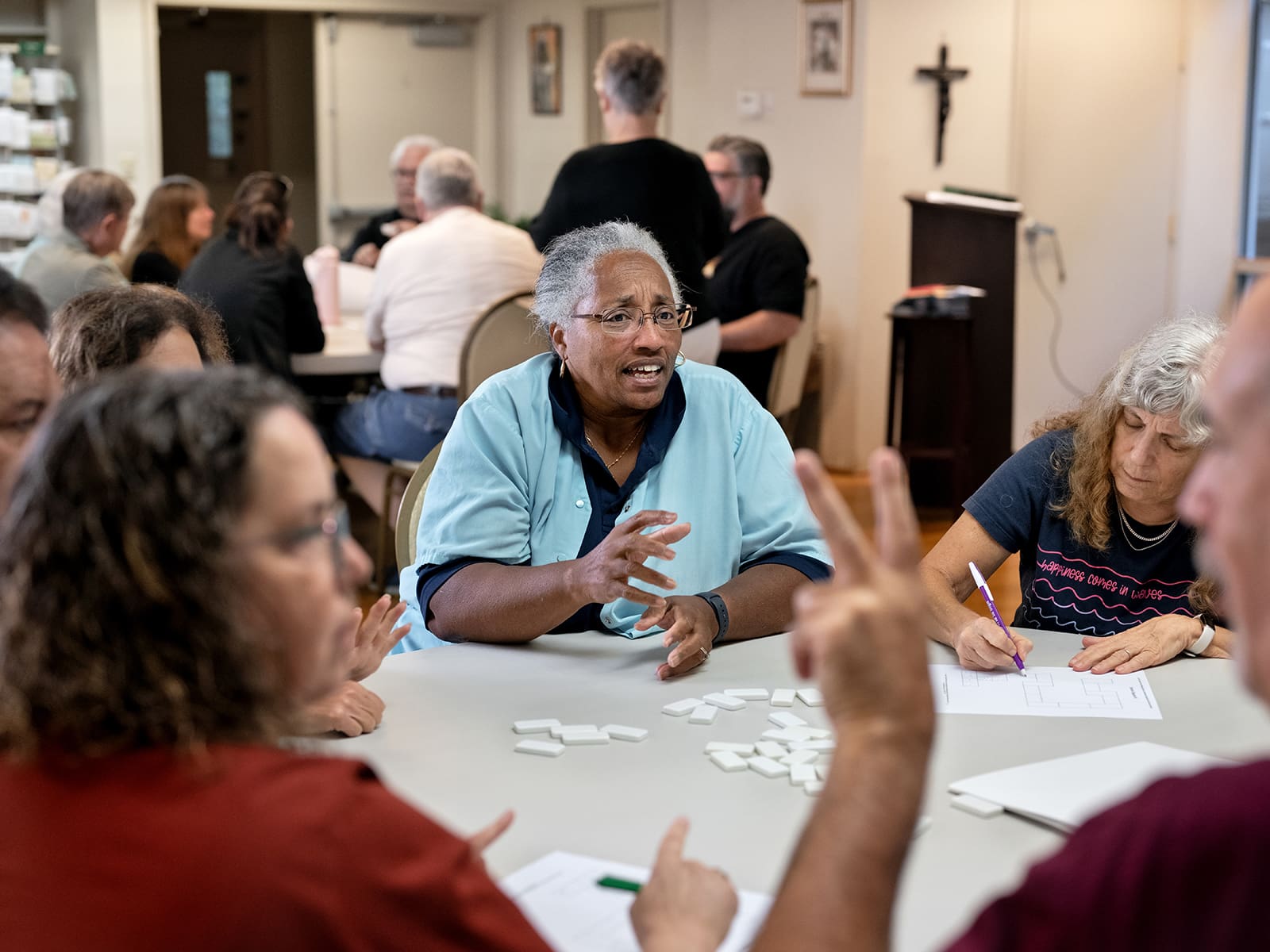 Arthine Powers signs during a team-building exercise during the 2022 National Deaf Cursillo at Ignatius House Jesuit Retreat Center in Sandy Springs. The gathering was held Sept. 22-25. Photo by Johnathon Kelso