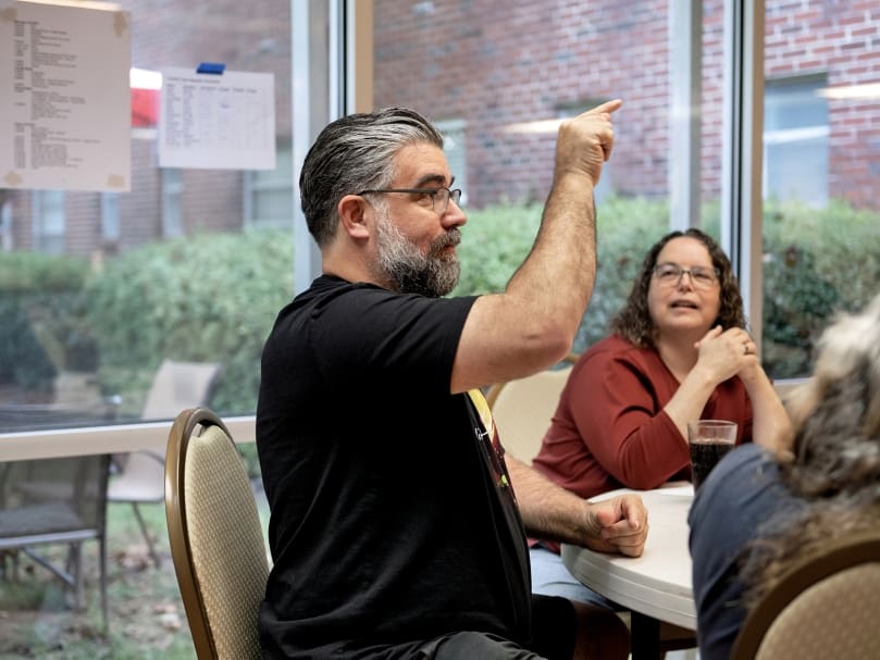Deacon Bill Griffin uses American Sign Language during the 2022 National Deaf Cursillo held at Ignatius House Jesuit Retreat Center in Sandy Springs. The three-day event teaches how to be faith leaders. Photo by Johnathon Kelso