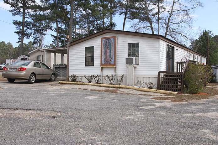 This trailer is where the Handmaids of the Sacred Heart of Jesus sisters reside and their chapel is located at the Pinewood Estates North mobile home community, Athens. Photo By Michael Alexander