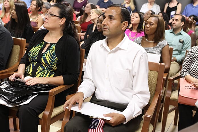 Regmi joins 162 other men and women who would become United States citizens on Aug. 29. Photo By Michael Alexander