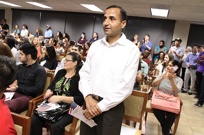 Just before the swearing in ceremony, an alphabetical roll call is done of each participantâs native country. Photo By Michael Alexander