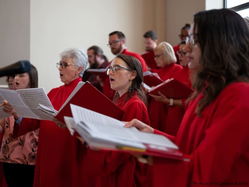 The choir of the Cathedral of Christ the King sings as the Mass of ordination to the priesthood begins at Holy Vietnamese Martyrs Church. Photo by Johnathon Kelso