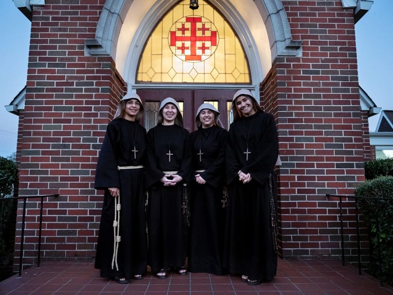 The Sisters Poor of Jesus Christ are seen  outside of their convent in Cedartown. From left to right are Sister Bernarda, Sister Cecilia, Sister Antonella and Sister Neriah. They have inspired much joy in the community. Photo by Johnathon Kelso
