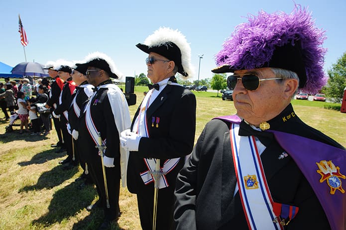 The Knights of Columbus honor guard falls in formation during the May 7 groundbreaking ceremony. Photo By Gibbs Frazeur
