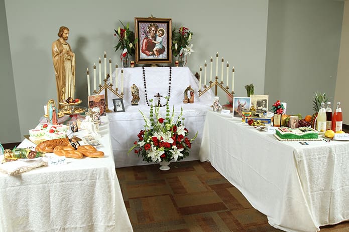 The feast of St. Joseph is March 19, but since it fell on a Sunday this year, it was observed on March 20, which was also the first day of spring. Holy Family Church, Marietta, marked the occasion with its display of a St. Joseph’s Altar. It was blessed by the parish administrator, Father Miguel Grave de Peralta, following the 9 a.m. Mass. Photo By Michael Alexander