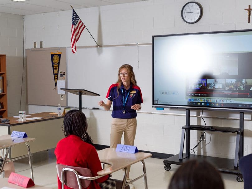 Science teacher Adeline Martin instructs her students on the first day of class at St. Mary's Academy in Fayette County. Photo by Johnathon Kelso