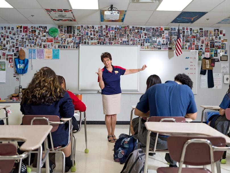 Math Teacher Ana De Mello instructs her students on the first day of school at St. Mary's Academy in Fayetteville. The school consolidated the communities of Our Lady of Victory School in Tyrone and Our Lady of Mercy High School. Photo by Johnathon Kelso
