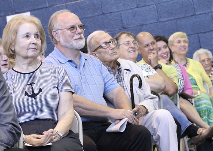 Parents, grandparents, parishioners, former students and teachers and volunteers were on hand for St. Maryâs 70th anniversary Mass in the school gymnasium on Sept. 1. Photo By Michael Alexander