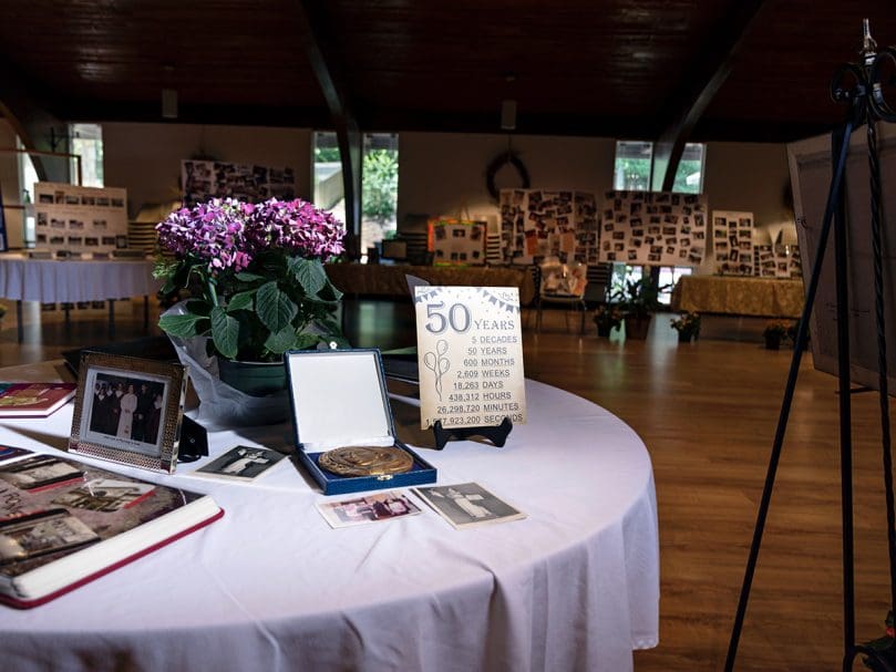 A collection of the rich history of the parish is displayed at St. Thomas Aquinas Church during the 50th anniversary celebration. Photo by Johnathon Kelso