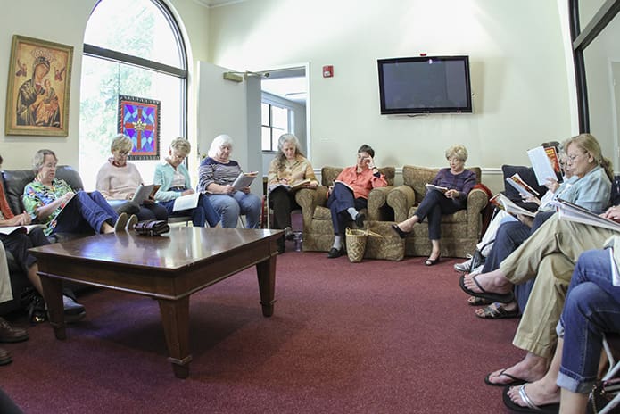 The RENEW Bible study group gathers Tuesday afternoon to discuss the readings for the upcoming Sunday. The group has been meeting for 13 years with a core unit of 18-25 participants. Louanne Bachner, fifth from the left, serves as the group’s facilitator. Photo By Michael Alexander
