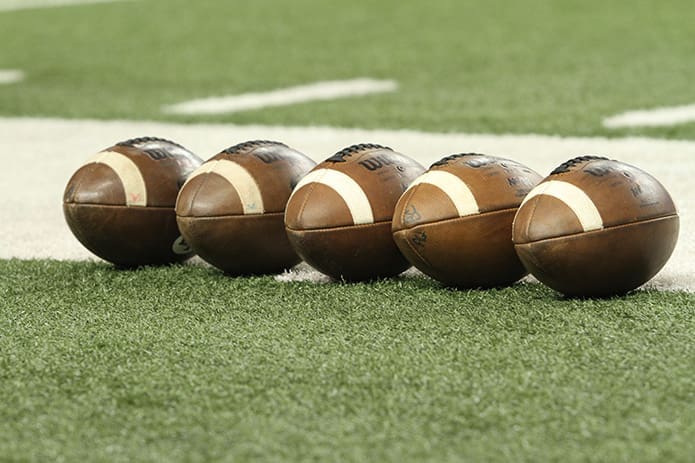 Game balls rest along the sideline in preparation of the Class AAA state football championship between Blessed Trinity High School, Roswell, and Atlanta’s Westminster. Photo By Michael Alexander