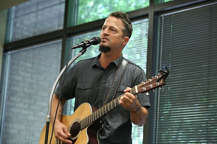 During a July 14 concert, recording artist and composer Michael Tolcher performs in Hall C on the terrace level of the Archdiocese of Atlanta’s Chancery. Michael is the son of Deacon Richard Tolcher, director of Prison and Jail Ministry in the Office of Life, Dignity and Justice. Photo By Michael Alexander